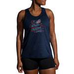Woman wearing Brooks Distance Tank 2.0 in navy with patriotic Run USA graphic print