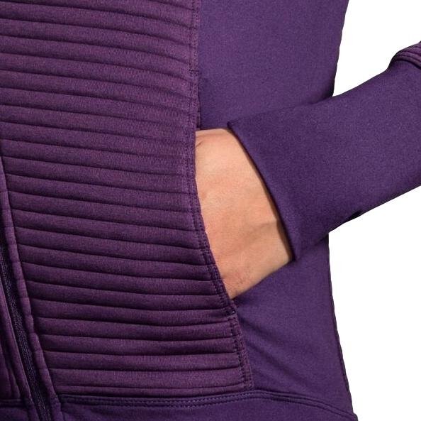 Close-up of purple Brooks hoodie showing textured side panel and hand in pocket