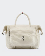 On Track Pack 35L Lite Unisex tote bag in cream with rope handles and On logo