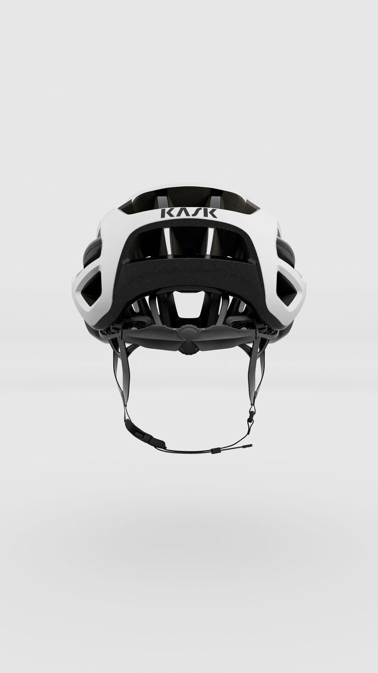 Kask Valegro cycling helmet in white and black colorway shown from rear view