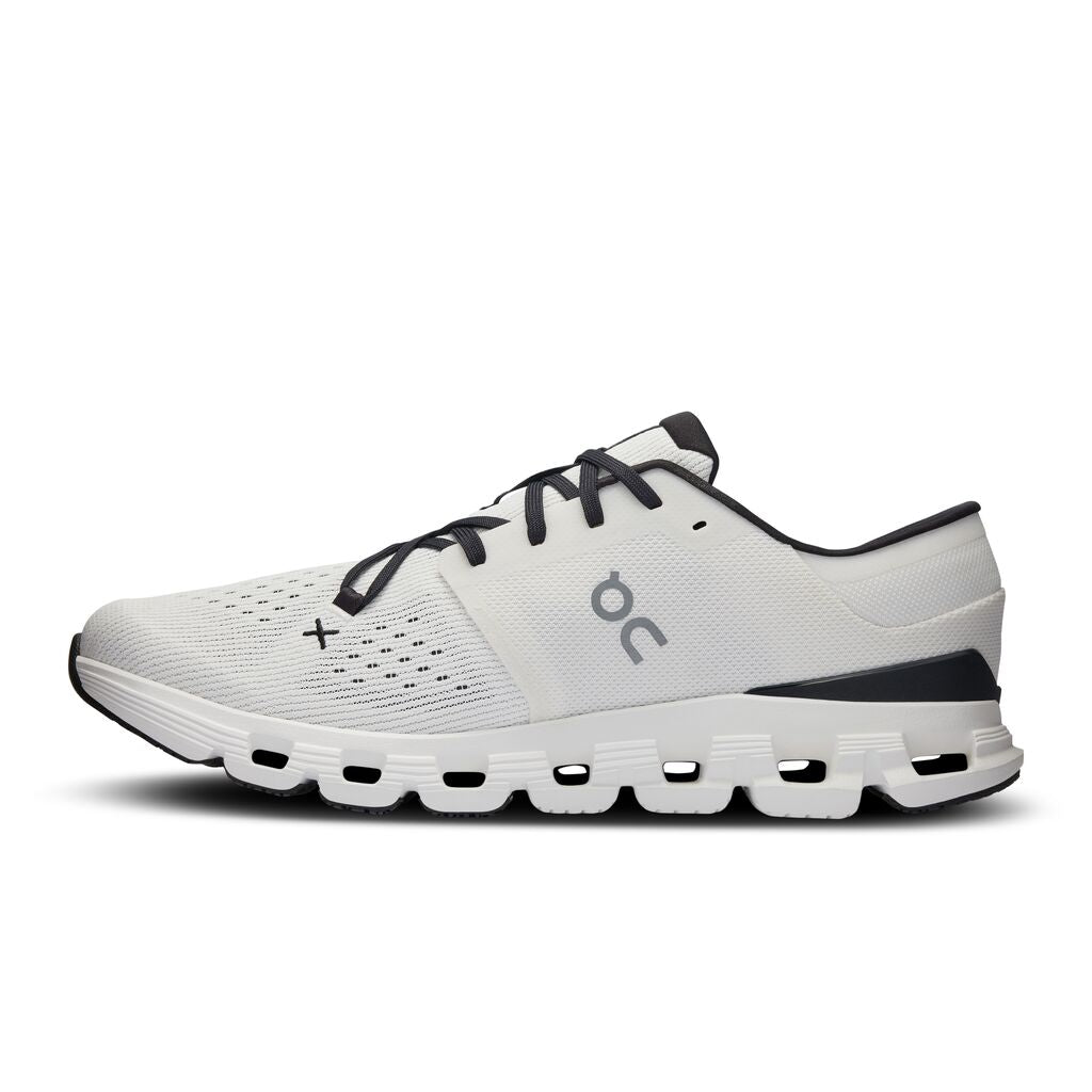 On Cloud X 4 running shoe in ivory white with black trim and laces