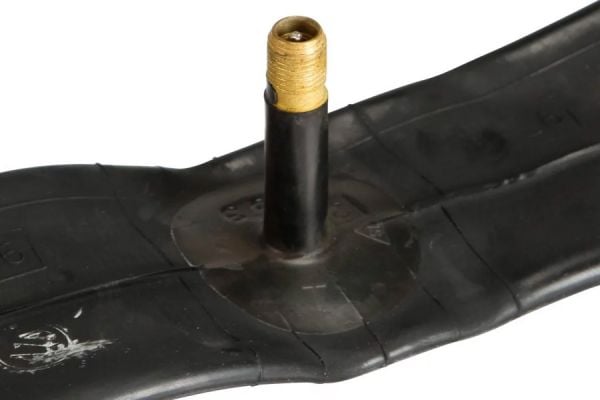 Black Eltin bicycle inner tube with brass valve stem on white background