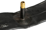 Black bicycle inner tube with brass valve stem on white background