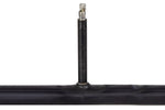 Black bicycle inner tube with Presta valve against white background