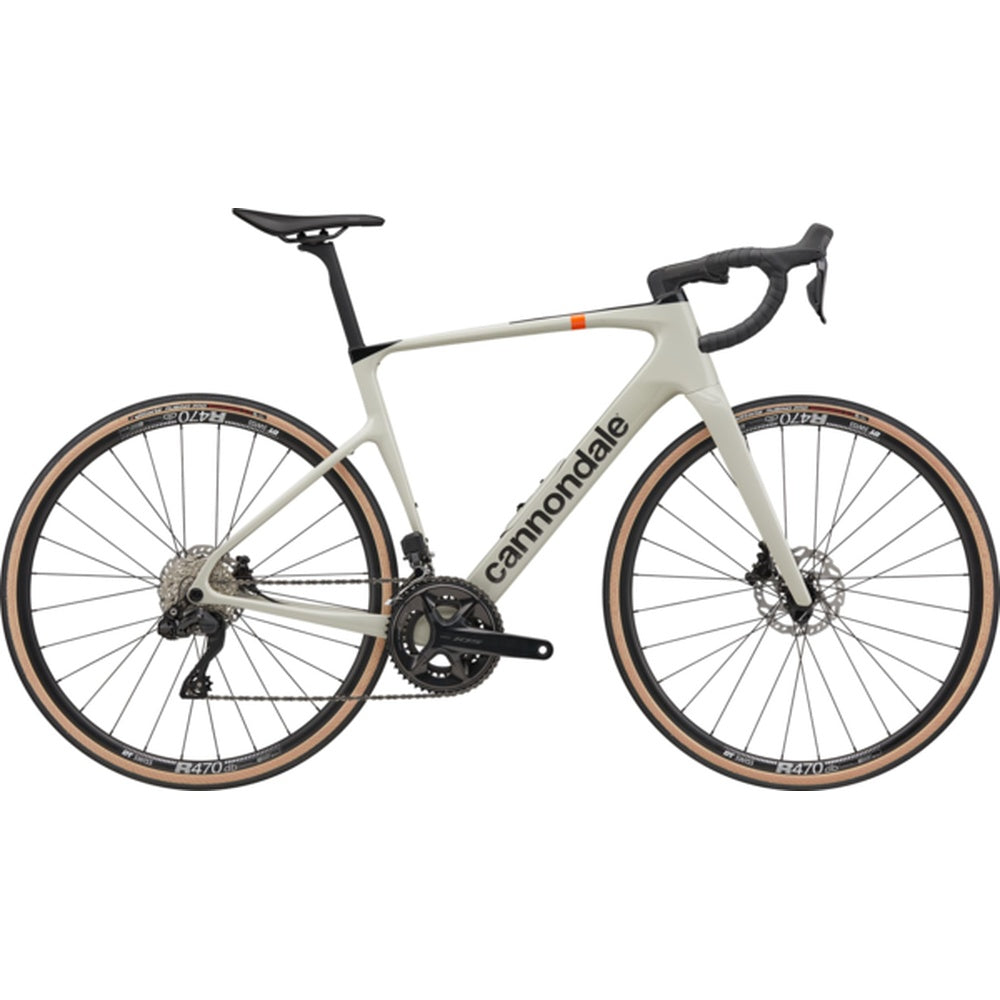 Cannondale SuperSix Evo HM Disc road bike in light gray with orange accents and tan tires