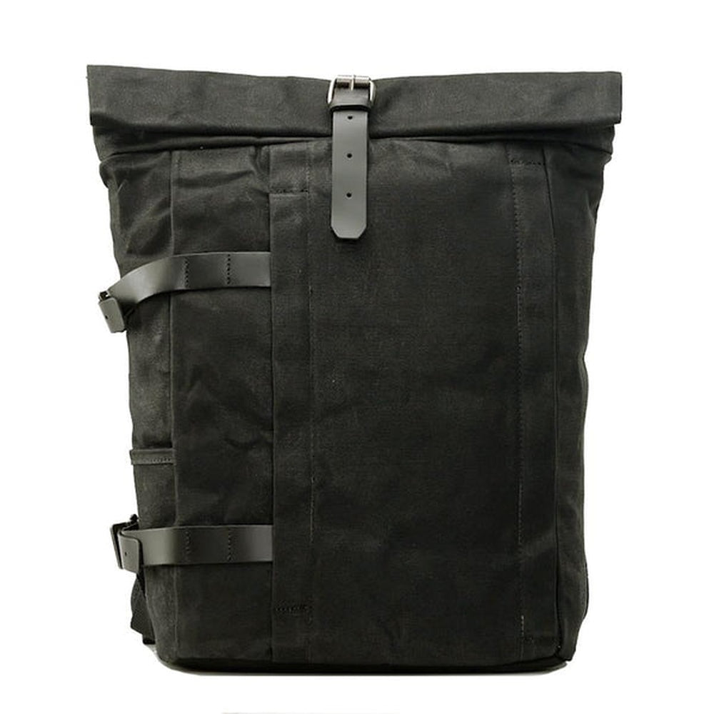 Black Patagonia Refugio daypack with roll-top closure and leather straps