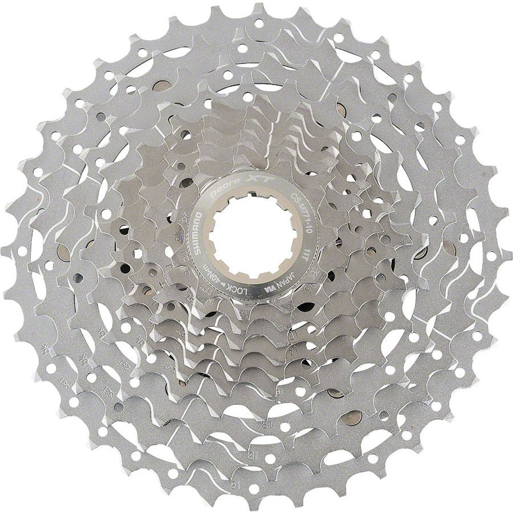 Shimano Deore XT 10-speed bicycle cassette with multiple sprockets in silver finish