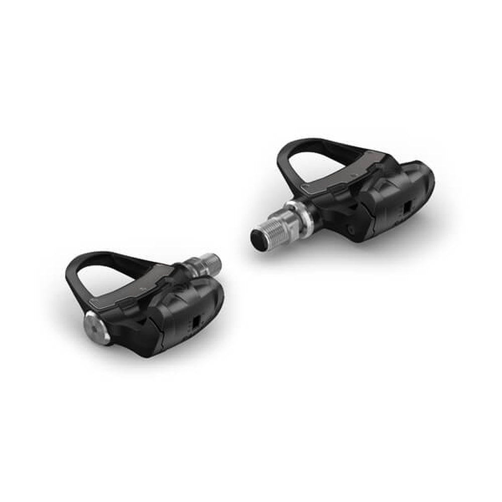 Two black Garmin Rally RK100 power meter pedals on white background