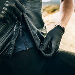 Gobik Vest Plus 2.0 Men's in Citizen color showing dark charcoal cycling vest with textured fabric details