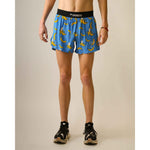 ChicknLegs 4-inch split running shorts in blue banana print pattern on model