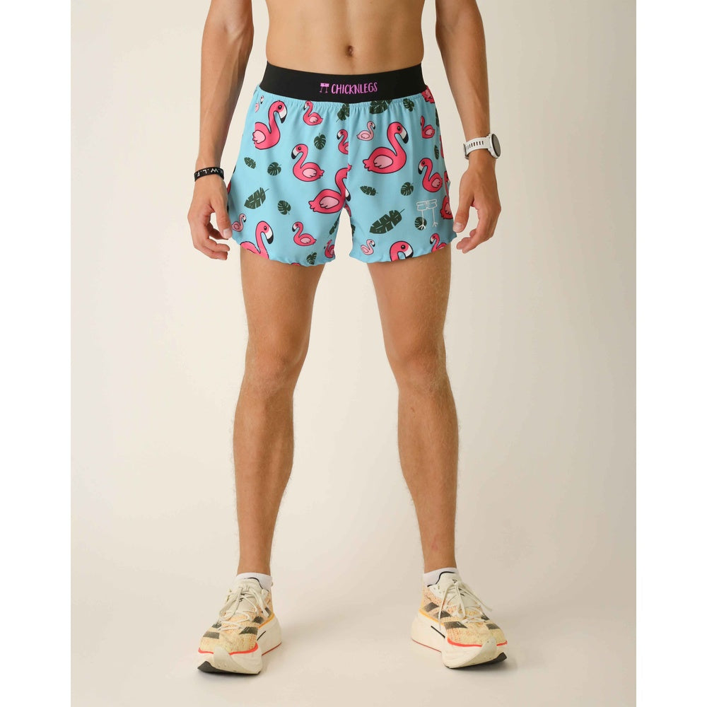 ChicknLegs men's light blue running shorts with pink flamingo and tropical leaf pattern