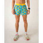 ChicknLegs men's blue running shorts with yellow rubber duck pattern and yellow waistband