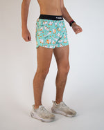 ChicknLegs men's turquoise shorts with white silly goose pattern and black waistband