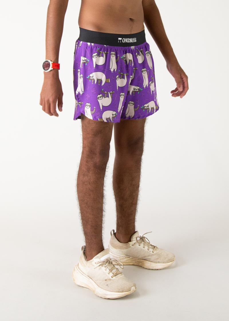 Purple athletic shorts with cute sloth pattern worn by male model