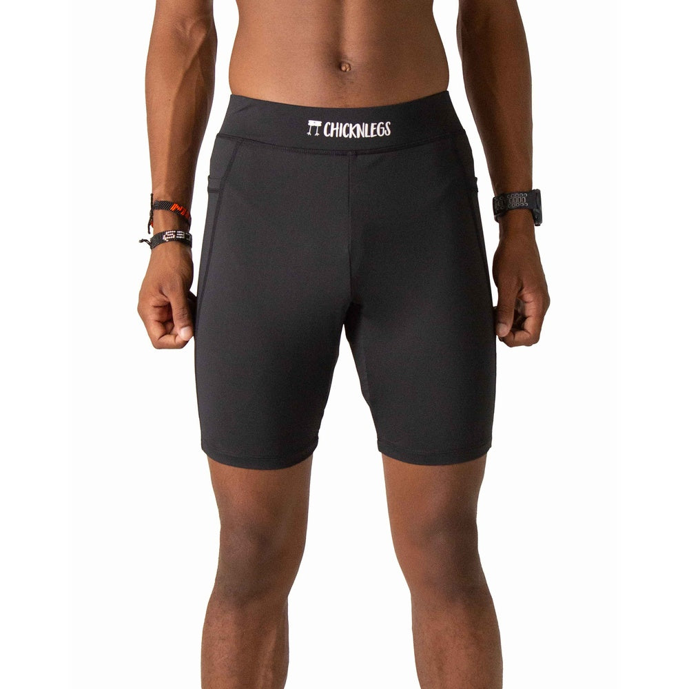 Black ChicknLegs 8 inch half tights compression shorts on male model