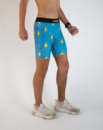 Man wearing blue half tights with yellow lightning bolt pattern and black waistband