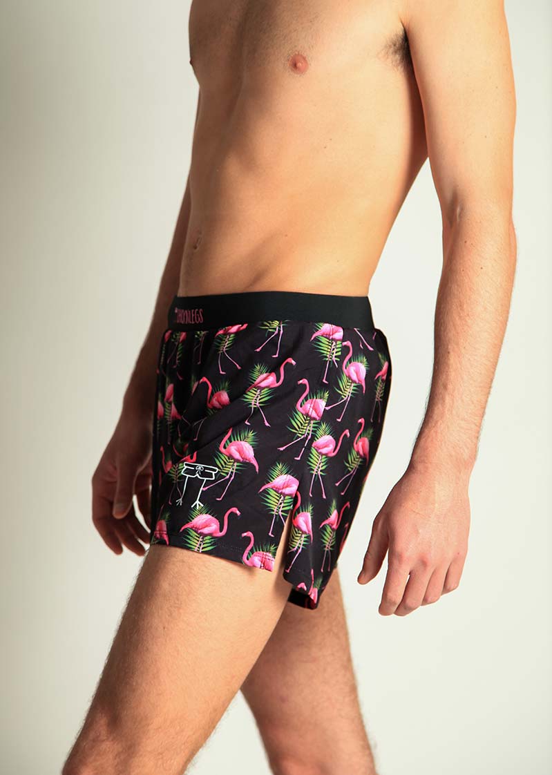 ChicknLegs men's black swim shorts with pink flamingo and tropical pattern