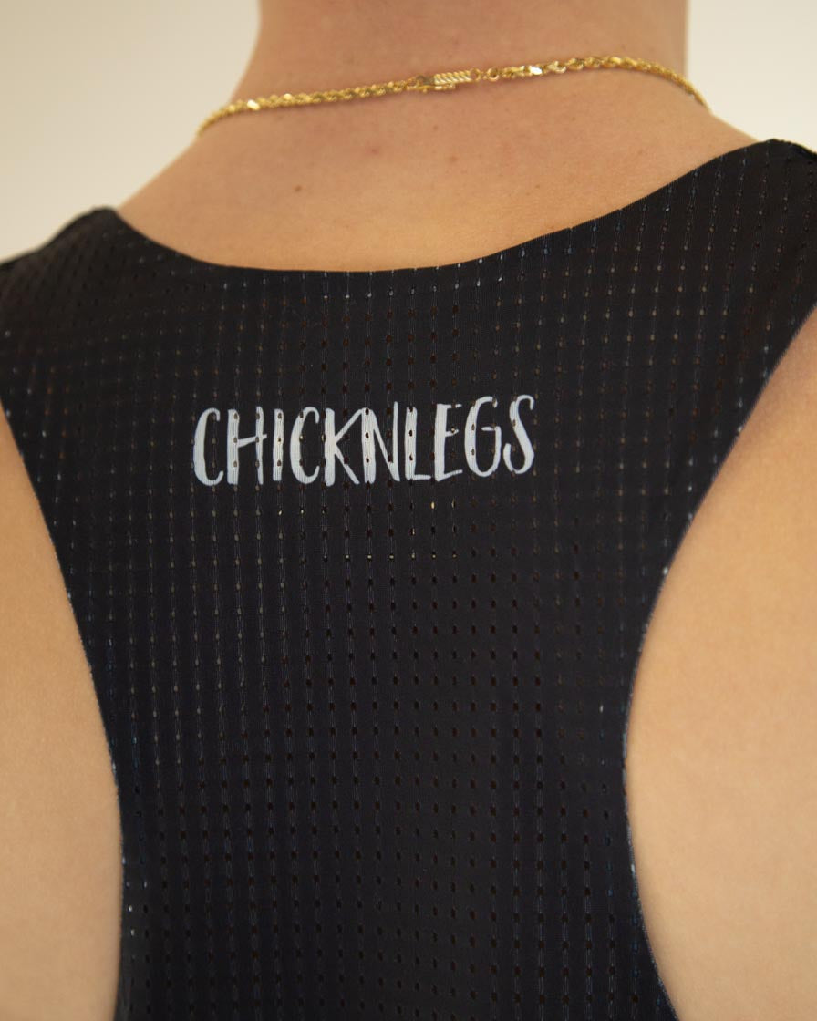 Black ChicknLegs performance singlet worn by model showing back design and fit
