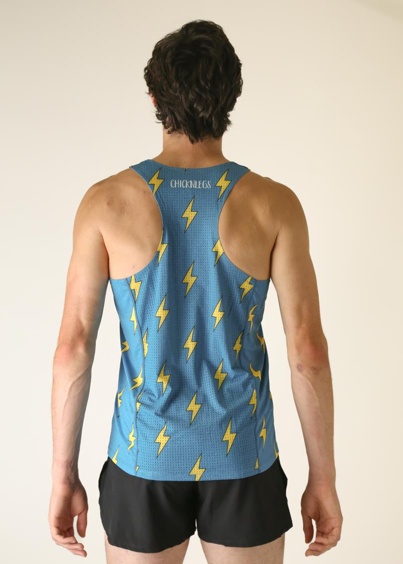 Back view of man wearing blue ChicknLegs performance singlet with yellow lightning bolts