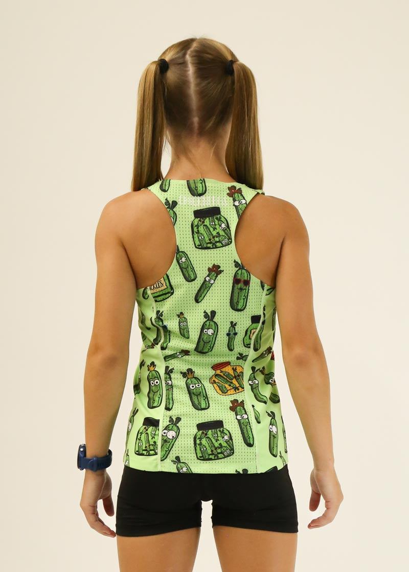 Back view of woman wearing light green racerback tank with cartoon pickle print