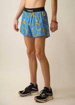 ChicknLegs 4-inch split running shorts in blue banana print with black waistband