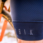 Gobik Absolute 5.0 Women's Bib Shorts in Deep Blue with professional studio lighting