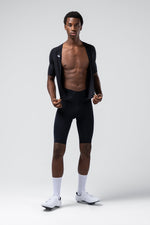 Gobik Integral Hudson Solid Men black cycling suit shown open on model revealing bib shorts