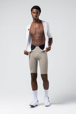 Gobik Aerosuit Madison Men Crisp white jersey pulled open showing bib shorts construction underneath