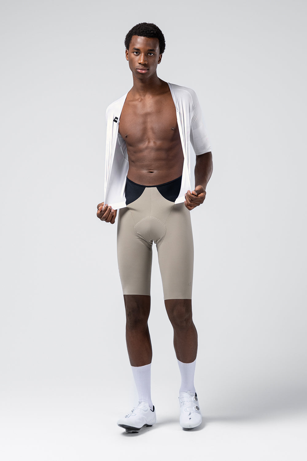 Gobik Aerosuit Madison Men Crisp white jersey pulled open showing bib shorts construction underneath