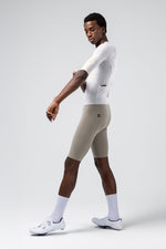 Gobik Aerosuit Madison Men Crisp white colorway side profile view on male model walking
