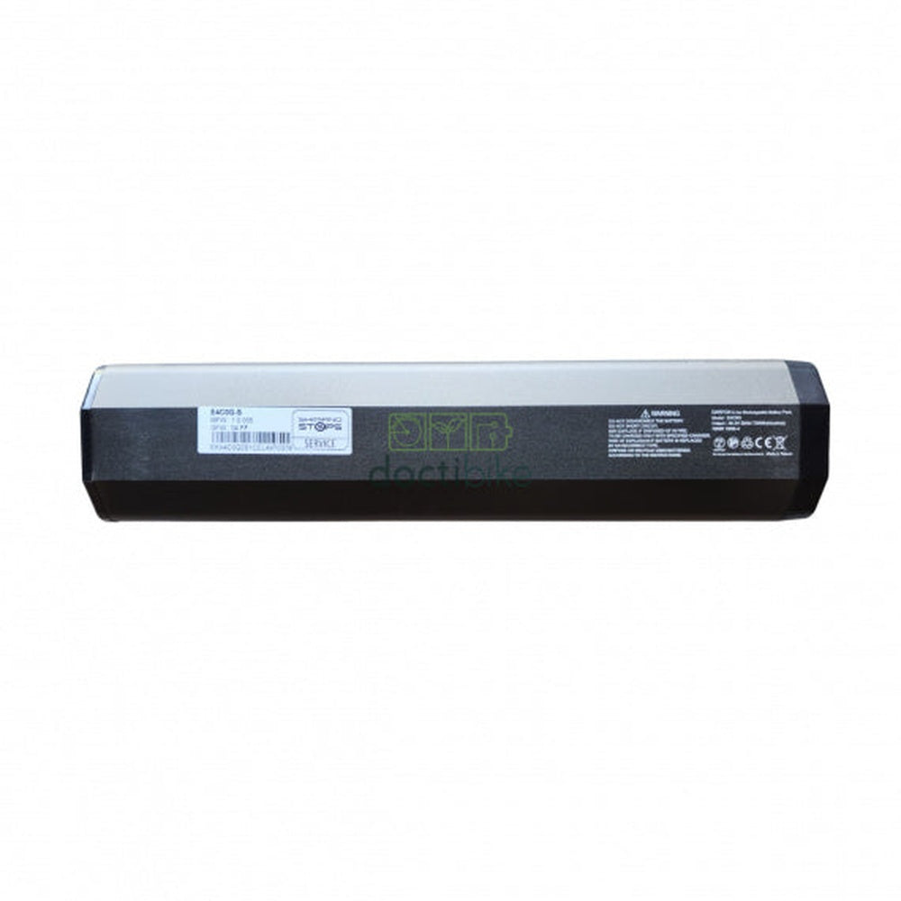 Shimano silver and black rectangular battery pack with product labels