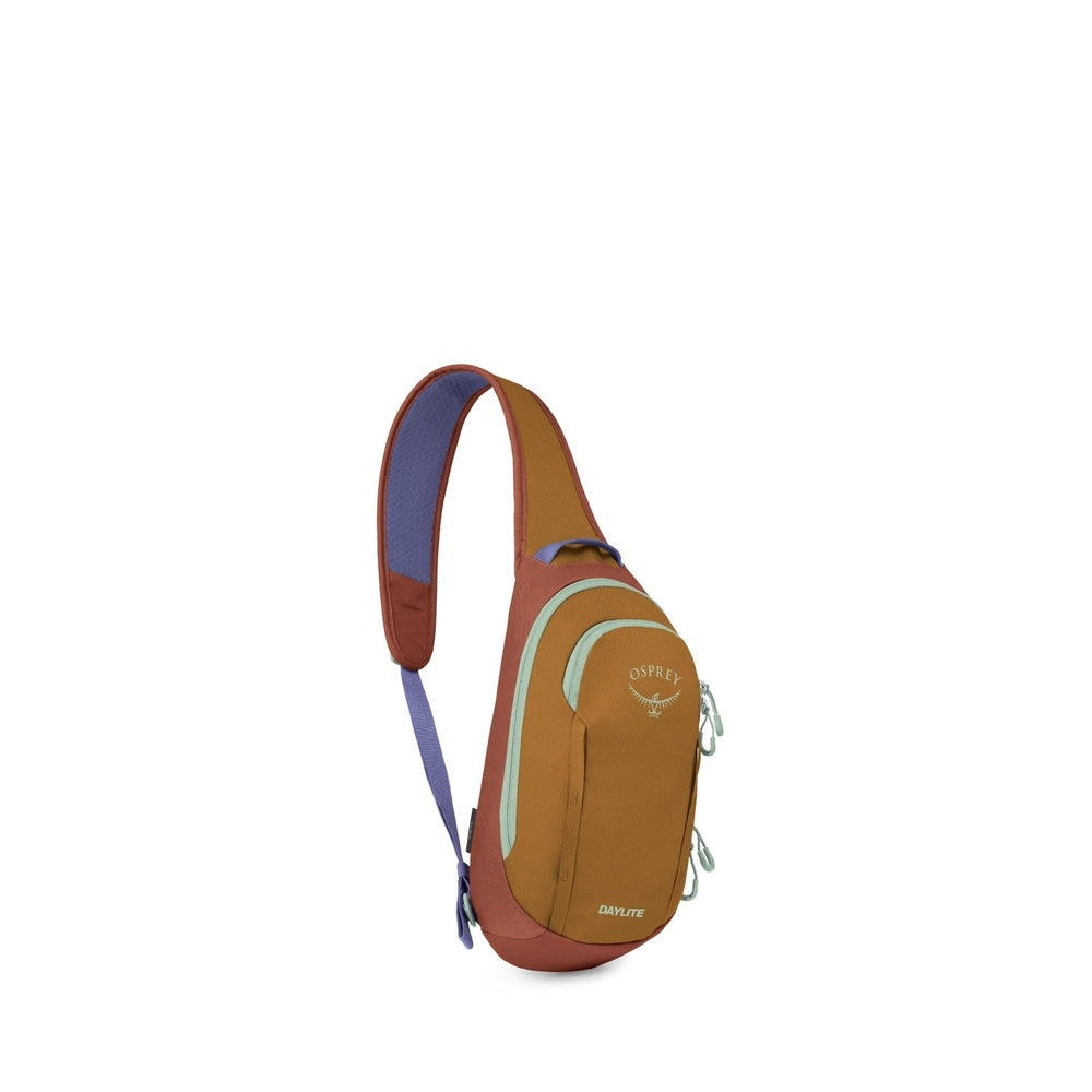Osprey Daylite sling bag in tumbleweed yellow with colorful shoulder strap