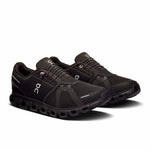 On Cloud 6 men's running shoes in black with white accents on clean background