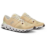 On Cloud X 3 women's running shoes in savannah beige with white sole