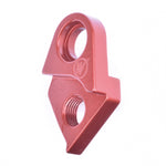 Red anodized Wheels Manufacturing derailleur hanger with threaded mounting hole on white background