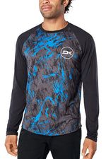 Man wearing Dakine long sleeve jersey with blue abstract pattern on black sleeves