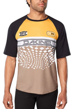Dakine Dropout jersey with golden yellow top, black sleeves, geometric pattern