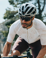 KASK Protone Icon cycling helmet in grey worn by cyclist in racing position