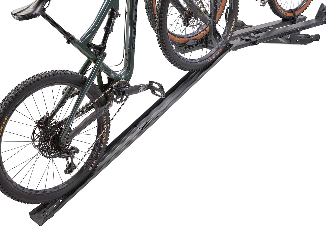 Yakima RampUp bike loading ramp system with mountain bikes on white background