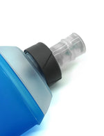Close-up of Fitletic blue soft flask top showing bite valve nozzle and black screw cap detail