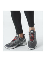 Salomon Supercross 3 men's trail running shoes in gray colorway on model feet