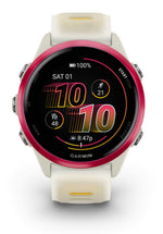Garmin Forerunner smartwatch with bone white strap and raspberry pink bezel