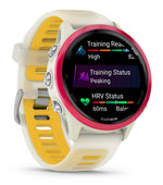 Garmin Forerunner smartwatch in whitestone with yellow band showing training metrics display