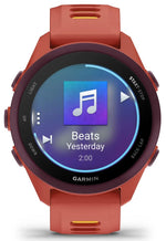 Garmin Forerunner 165 Music smartwatch in red with music playback interface displayed