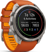 Garmin Fenix 9 Pro with titanium case and orange band displaying activity tracking statistics screen
