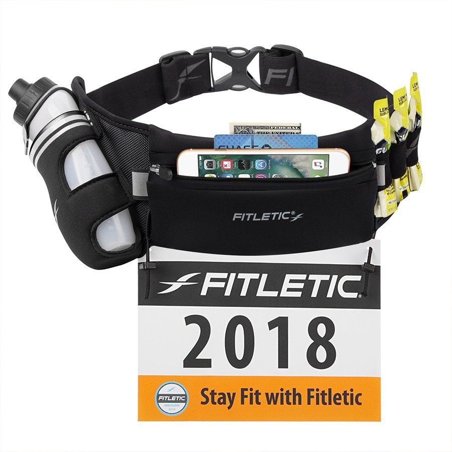 Fitletic Fully Loaded black running belt displayed with phone, cash, water bottle and energy gels loaded