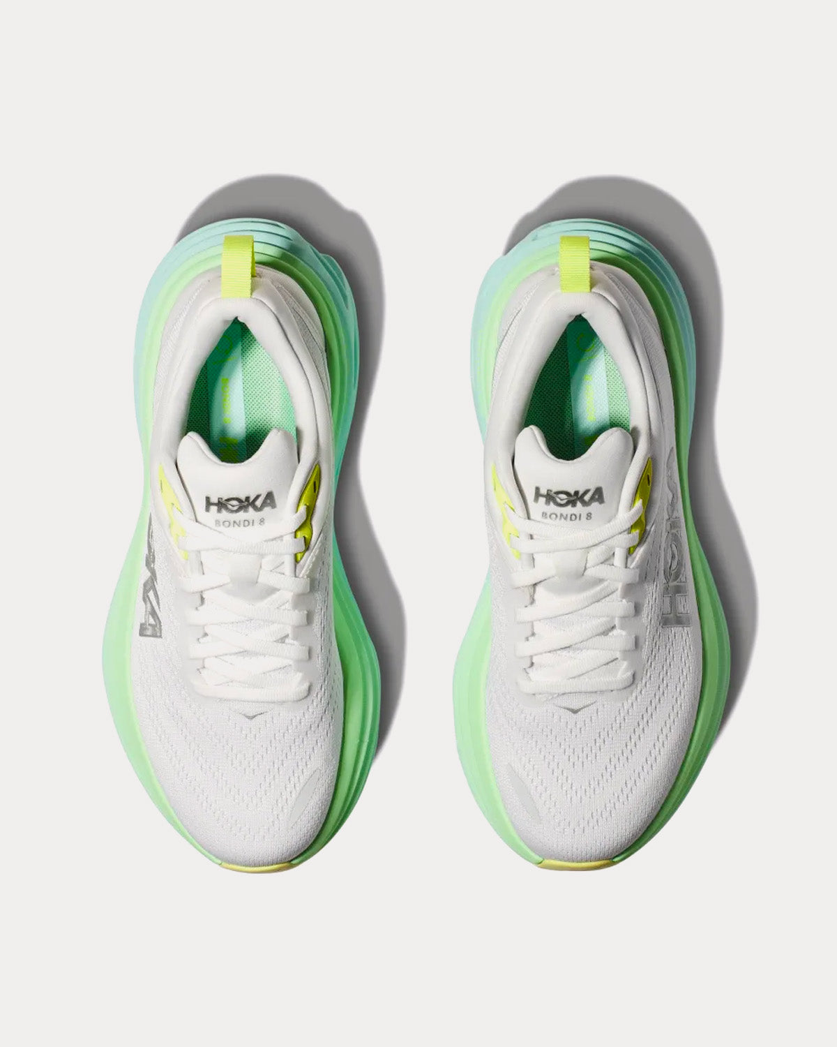 HOKA Bondi 8 women's running shoes in white with green ocean-inspired colorway