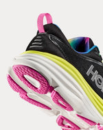 Hoka Bondi 8 women's running shoe in black with citrus yellow midsole and pink outsole