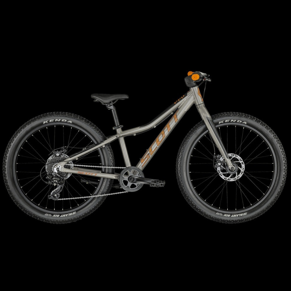 Scott Roxter 24 kids mountain bike in matte silver with orange accents and Kenda tires