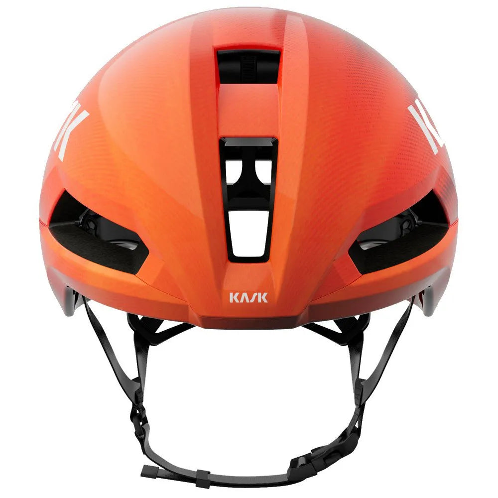 Kask Nirvana aero road cycling helmet in Cherry Burst orange-red colorway with professional studio lighting